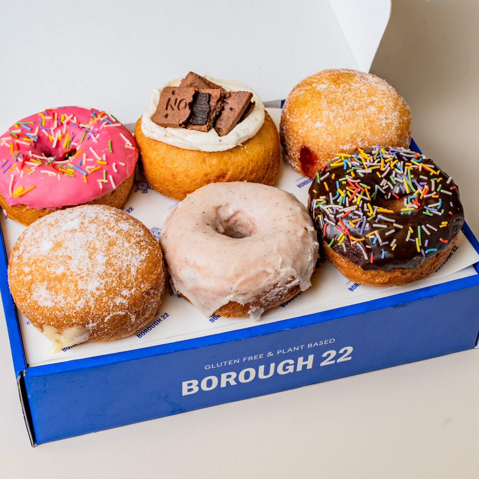 6 assorted gluten free and vegan fried doughnuts 