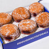Gluten-free, vegan jam-filled doughnuts in a Borough 22 box
