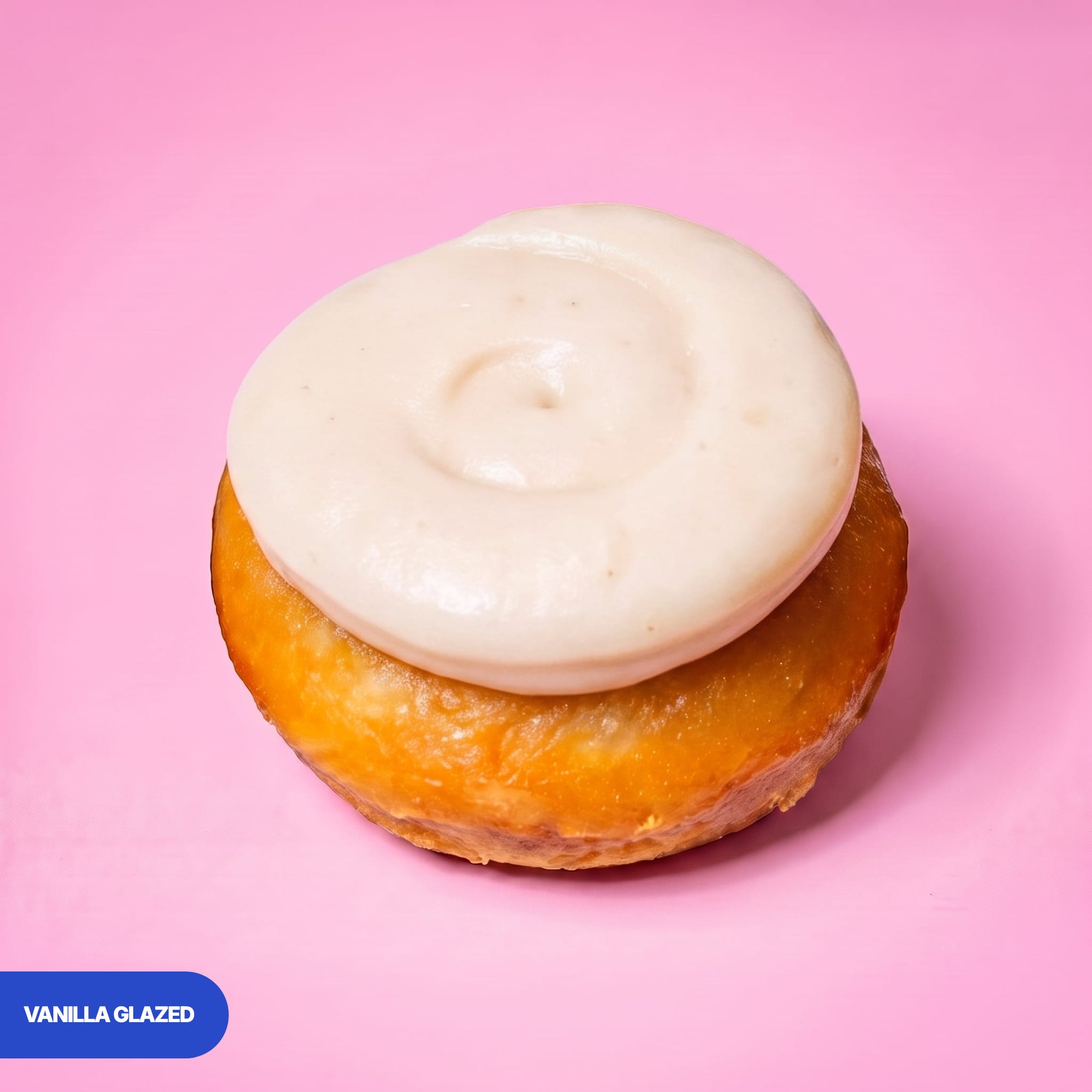 Gluten free vegan baked vanilla glazed doughnut topped with a thick disc of vanilla icing