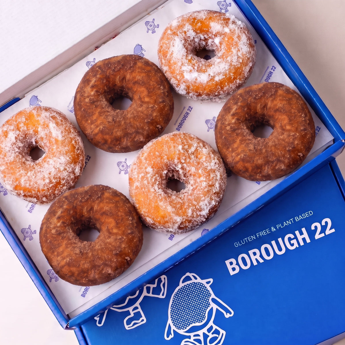Open Borough 22 box of six gluten free vegan baked ring doughnuts, three rolled in cinnamon sugar and three in caster sugar