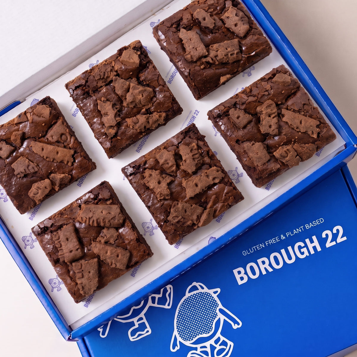 Open Borough 22 box of six gluten free vegan chocolate crunch brownies topped with caramelised biscuit pieces