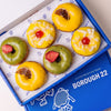 Open Borough 22 box of six gluten free vegan fried doughnuts, two matcha with freeze dried strawberry, two mango lime and two pina colada with coconut and cherry