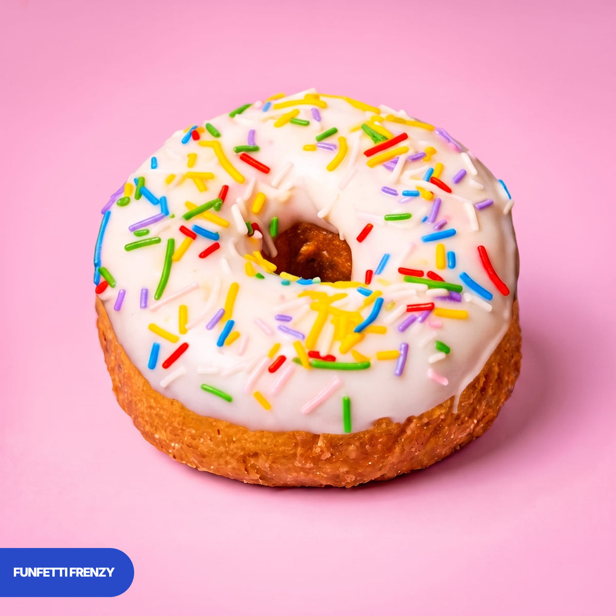 Gluten free vegan fried funfetti ring doughnut, vanilla icing covered in rainbow sprinkles