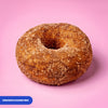 Gluten free oat free vegan fried ring doughnut rolled in cinnamon sugar